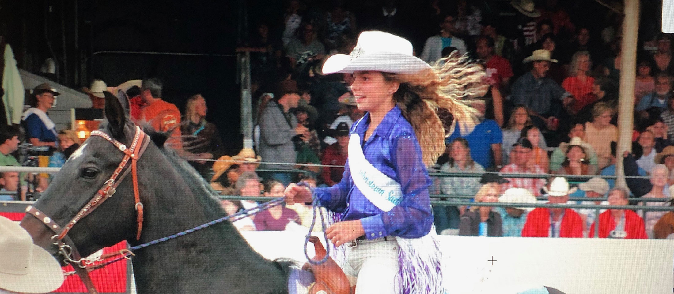 Hailey Frederiksen riding a horse from 2009.